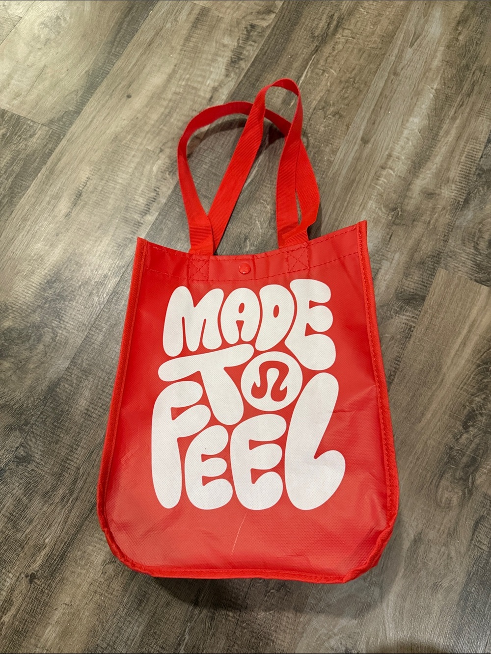 lululemon athletica Red Tote with White 'Made to Feel' Graphic